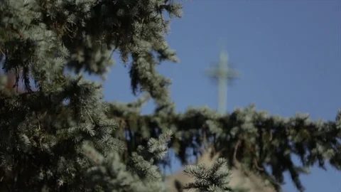 Chapel steeple cross and tree branches Stock Footage 83351645