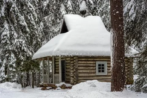 Chapel in the winter forest. Stock Photos
