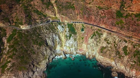 Chapman's Peak cove aerial, dramatic cliff walls and teal water Stock Footage 339181356