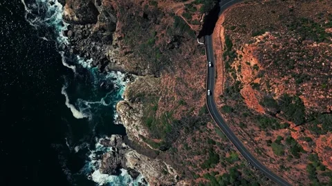 Chapman's Peak Drive cliff road, extended aerial segment Stock Footage 340558551