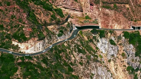 Chapman's Peak Drive top-down aerial, cars on coastal cliff road Stock Footage 339181709