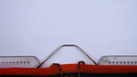 Chapter 4 - phrase printed on an old typewriter in red letters, close up. Stock Footage 126510025