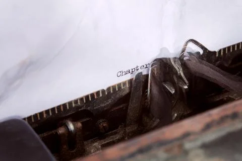 "chapter" written on a typewriter Stock Photos