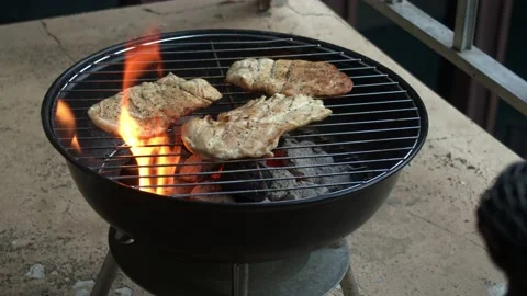 Char Grilling Chicken Over Open Flame Grill Video stock 132018522