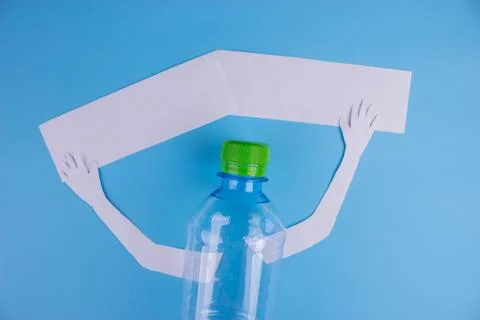 Character plastic bottle with poster Stock Photos