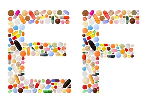 Characters e and f made of colorful pills Foto stock