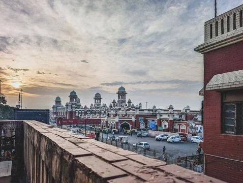 Charbagh Historic red railway station at sunset Stock Photos