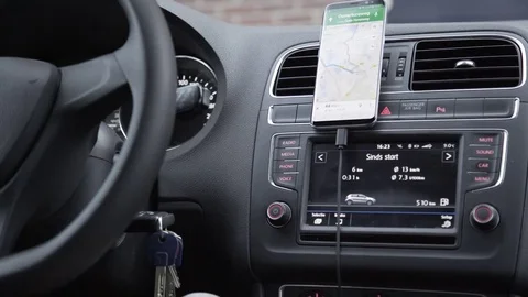 Charching mobile in car and starting navigation Stock Footage 85224401