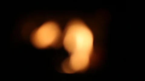 The charcoal and ash of the fireplace provide a great heat. Stock Footage 106490793