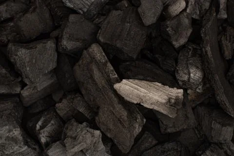 Charcoal with ash close up Stock Photos