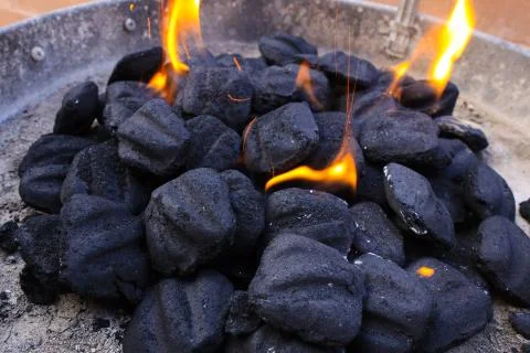 Charcoal bricks Stock Photos