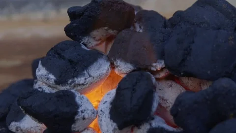 Charcoal briquettes on fire Video stock 84273306