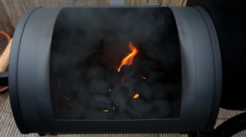Charcoal burning in a barbecue grill Stock Footage 36148936