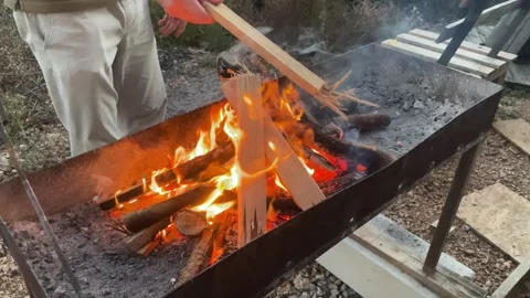 Charcoal burning in grill brazier for cooking barbecue Stock Footage 302845715