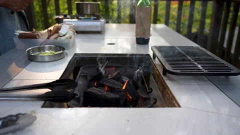 Charcoal burning at the  table Stock Footage 255028461