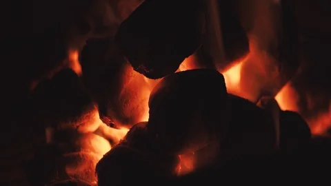 Charcoal on fire, getting ready for grill and party Stock Footage