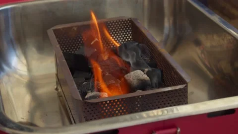 Charcoal on fire inside a barbecue grill Stock Footage 130265534