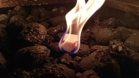 Charcoal fire starter, burning inside a barbeque Stock Footage 56063373