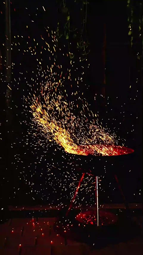 Charcoal Grill Fire Sparks Flying In Slow Motion At Night Background Stock Footage 346193077