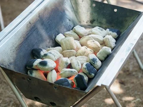 Charcoal grilling for BBQ Stock Photos