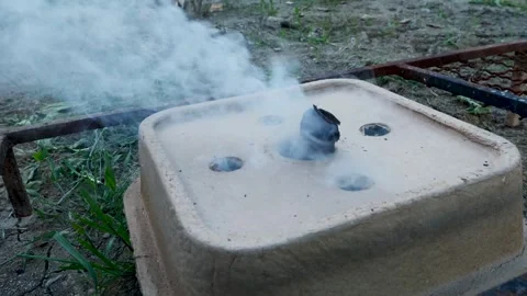 Charcoal starter box igniting with a smoke Stock-Footage 277514157
