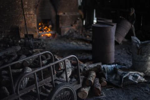 Charcoal worker Foto stock