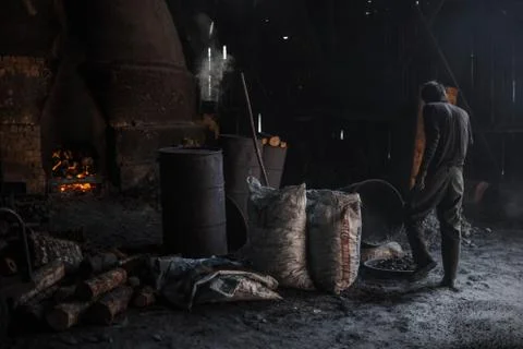 Charcoal worker Foto stock