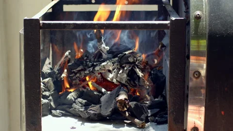 Charcoals catching fire and flames around in slow motion Vídeos de archivo 328738018