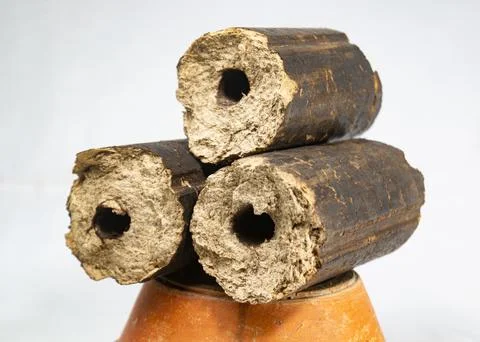 Charcoals, renewable solid fuel made from rice husk. cooking in a village p.. Фото