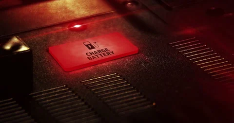 Charge battery symbol light flashing on metal control panel lamp Stock Footage 294627403