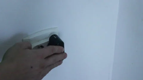 Charger plugged into the wall Stock Footage 55532085