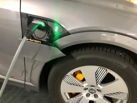 Charging an Audi e-tron SUV, the first electronic SUV by Audi Stock Photos