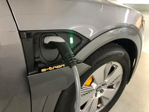 Charging an Audi e-tron SUV, the first electronic SUV by Audi Stock Photos