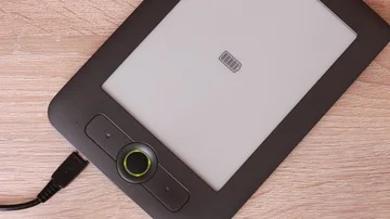 Charging battery of electronic book Stock Footage 86055092