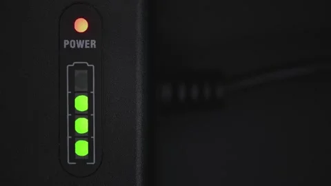 Charging battery icon blinking green with red power indicator Stock Footage 151207568