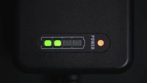 Charging battery icon blinking green with red power indicator Stock Footage 151237864