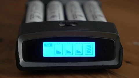 Charging battery process, lithium AA AAA rechargeable battery Stock Footage 231733958