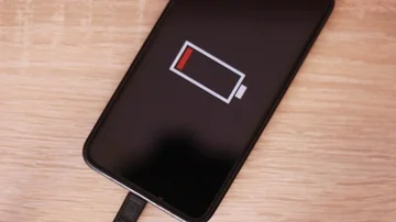 Charging battery of smartphone Stock Footage 86055482