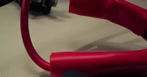 Charging clamps for charging. macro, camera moves up, shooting with slider clamp Stock-Footage 309479095