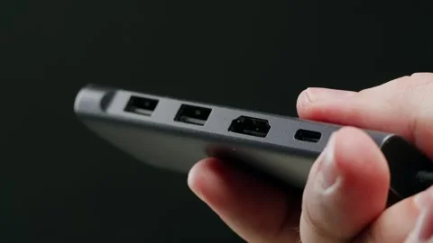 Charging connection for different devices close-up . Phone, laptop charging port Stock Footage 267506004