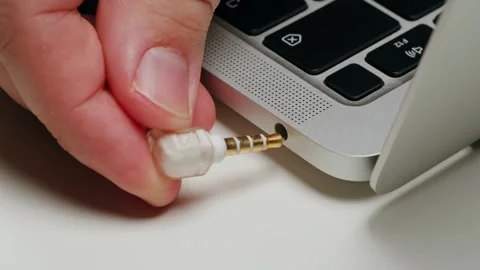 Charging connection to laptop on black background close-up . Phone charging port Video stock 267506038