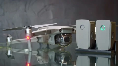 Charging drone batteries. LED indicator. Stock Footage 169242771