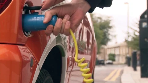 Charging electric car Stock Footage 78365955