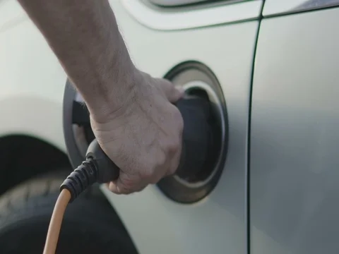 Charging of electric car Stock Footage