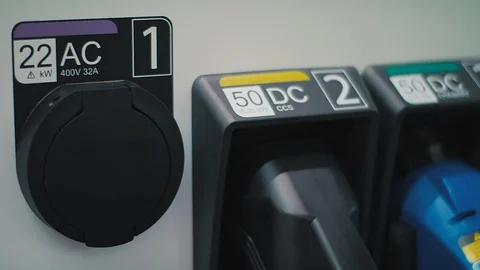 Charging of an electric car Stock Footage 92554597