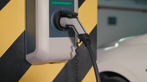 Charging of an electric car Stock Footage 92555267