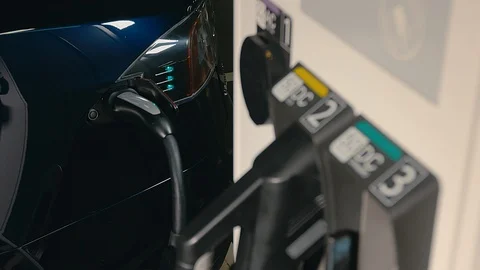 Charging of an electric car Stock Footage 92556284