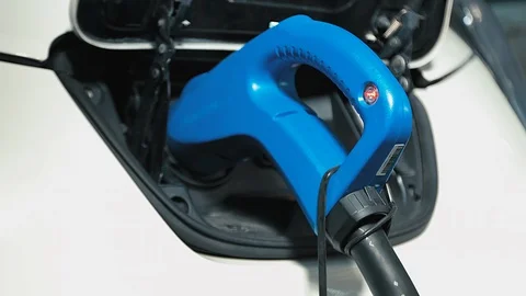 Charging of an electric car Stock Footage 92556972