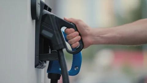 Charging of an electric car Stock Footage 92557908