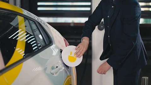 Charging of an electric car Stock Footage 92558926